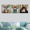 Colorful Kolo Abstract Animal Canvas Wall Art featuring frog, gorilla, and dog prints, perfect for kids' rooms and living rooms. 