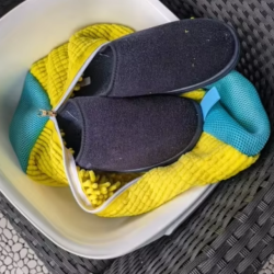 Durable anti-deformation shoe washing bag for protecting shoes in the washing machine, with a soft polyester cotton material and secure zipper closure.
