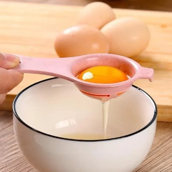 Eco-friendly wheat straw egg separator in pastel colors, perfect for easy and mess-free egg yolk separation in the kitchen.